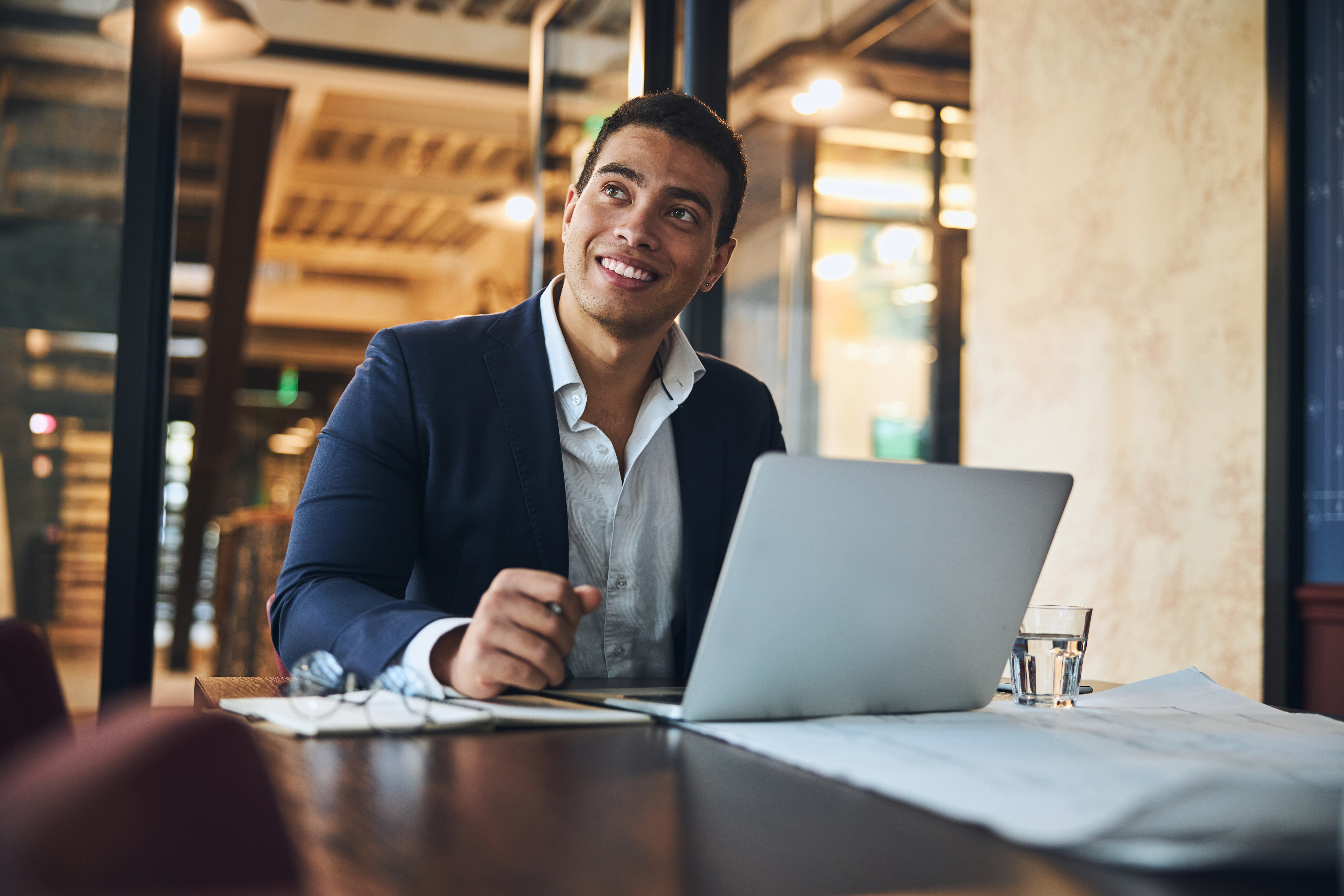 Business owner and CPA reviewing financials. Existing campaign photography or new stock.